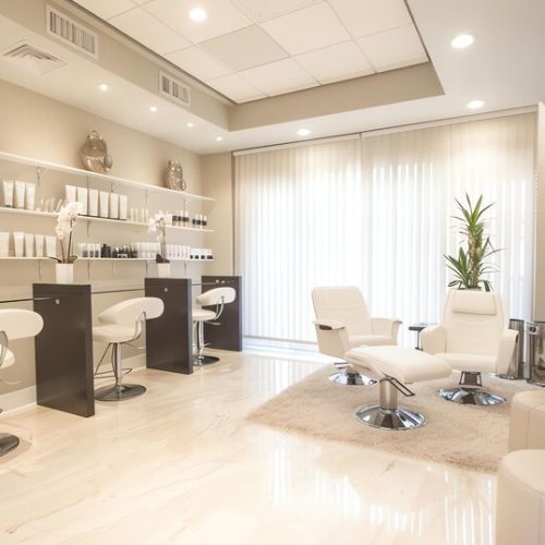 [freepicdownloader.com]-clean-modern-hair-salon-with-white-furniture-woodpaneled-wall-large